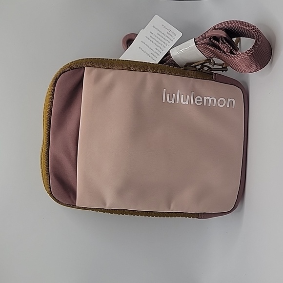 lululemon athletica Handbags - Lululemon NWT Easy access Crossbody bag Precocious Pink/Spiced Chai color RARE